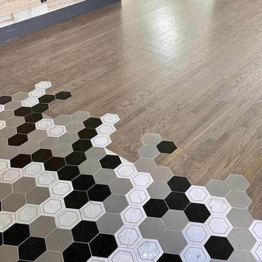 Custom hexagonal tile work in an entryway.