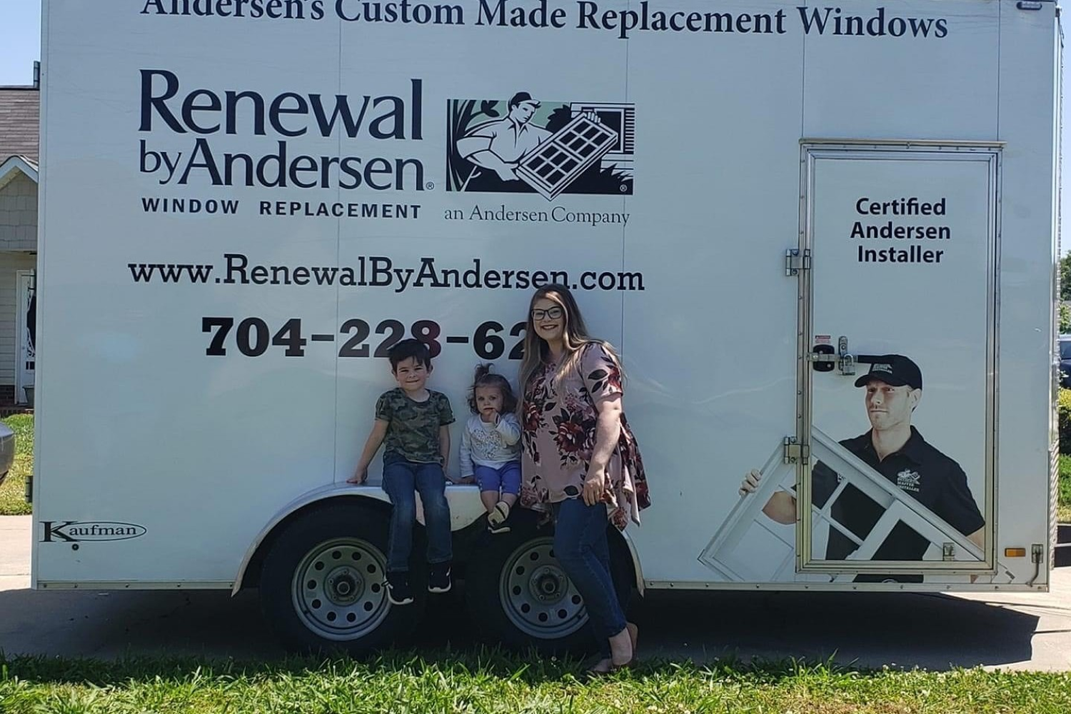 Marilena Villardi and family standing infront of a Renewal by Andersen truck ready to get their windows installed