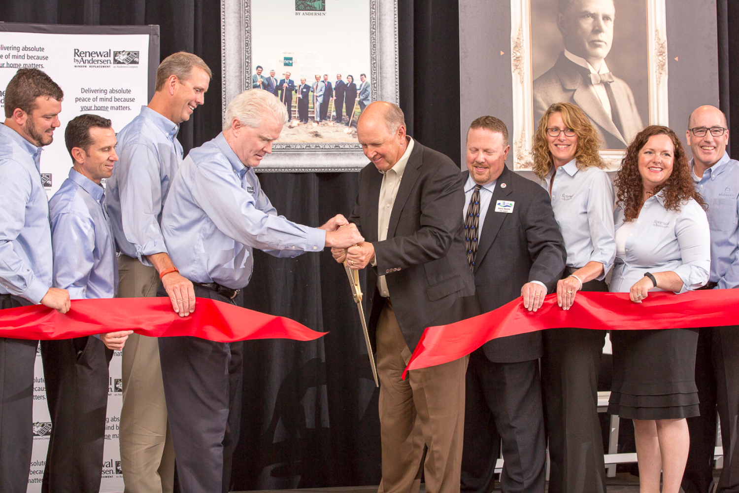 Paul and Troy cutting the ribbon for Cottage Grove expansion 2016