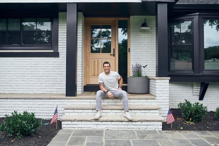 John Colaneri sits outside his house, just chilling.
