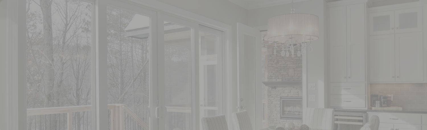 kitchen dining room with chandelier and large patio door